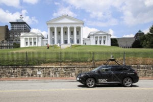 Torc vehicle drives by the Virginia State Capitol building. 
