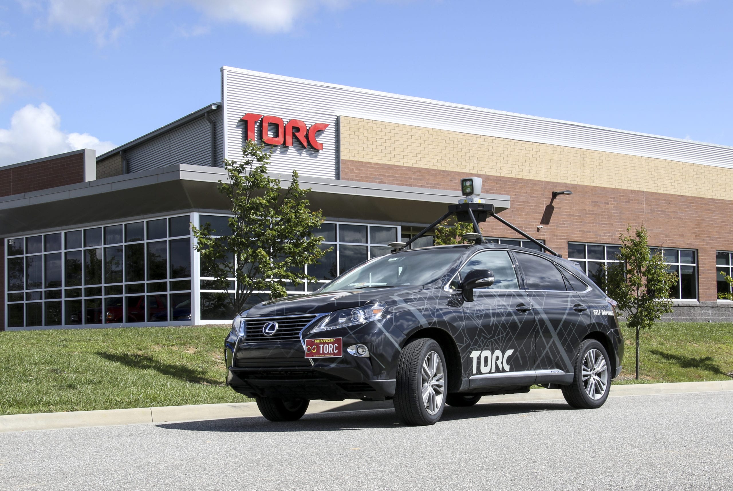 Torc vehicle in front of the Blacksburg Headquarters.