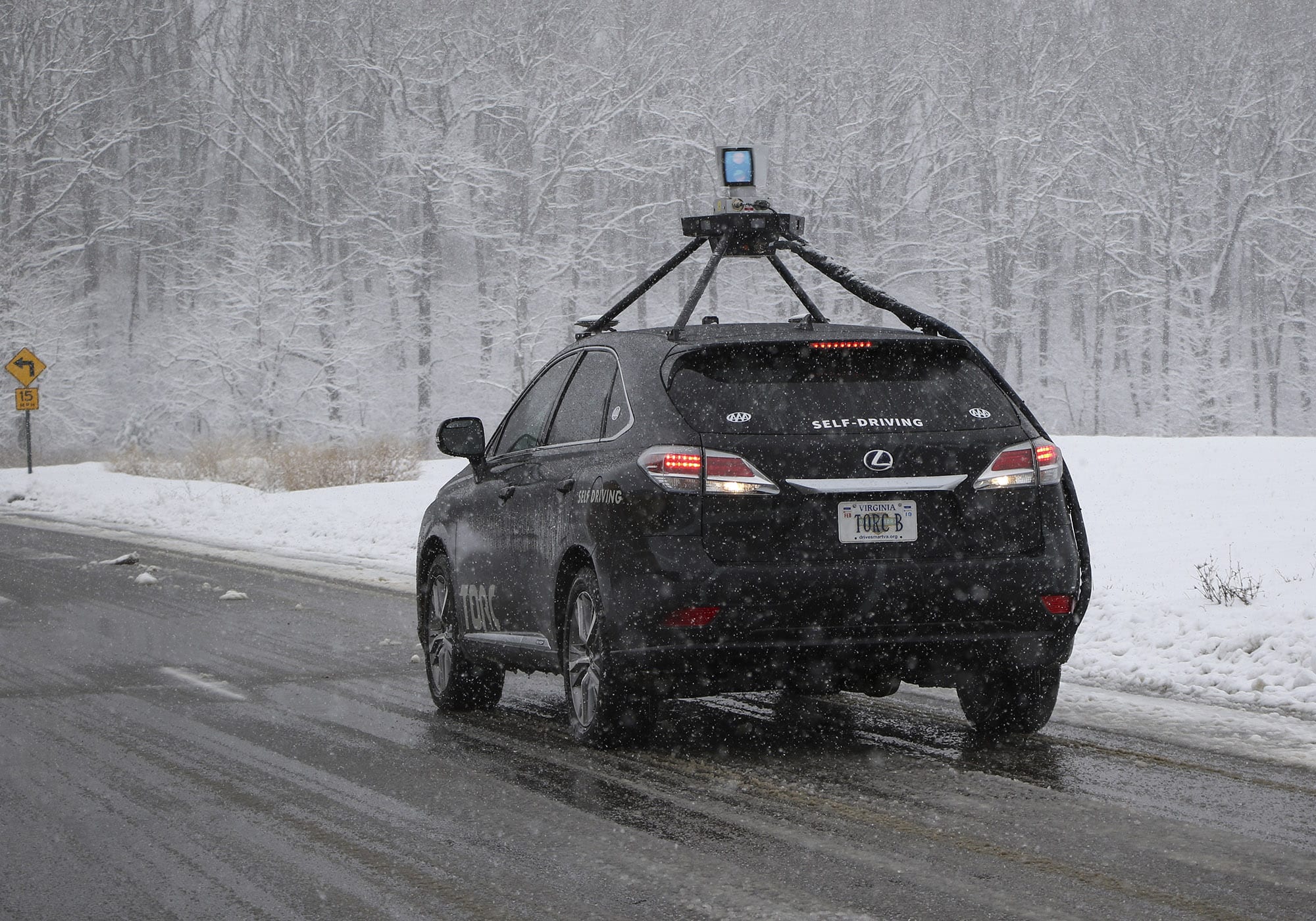 Asimov, Torc's self-driving vehicle, driving safely in a snowstorm.