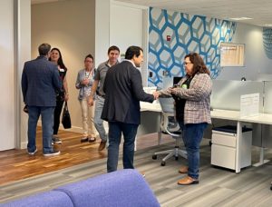 Visitors tour the new Torc Austin office during the grand opening